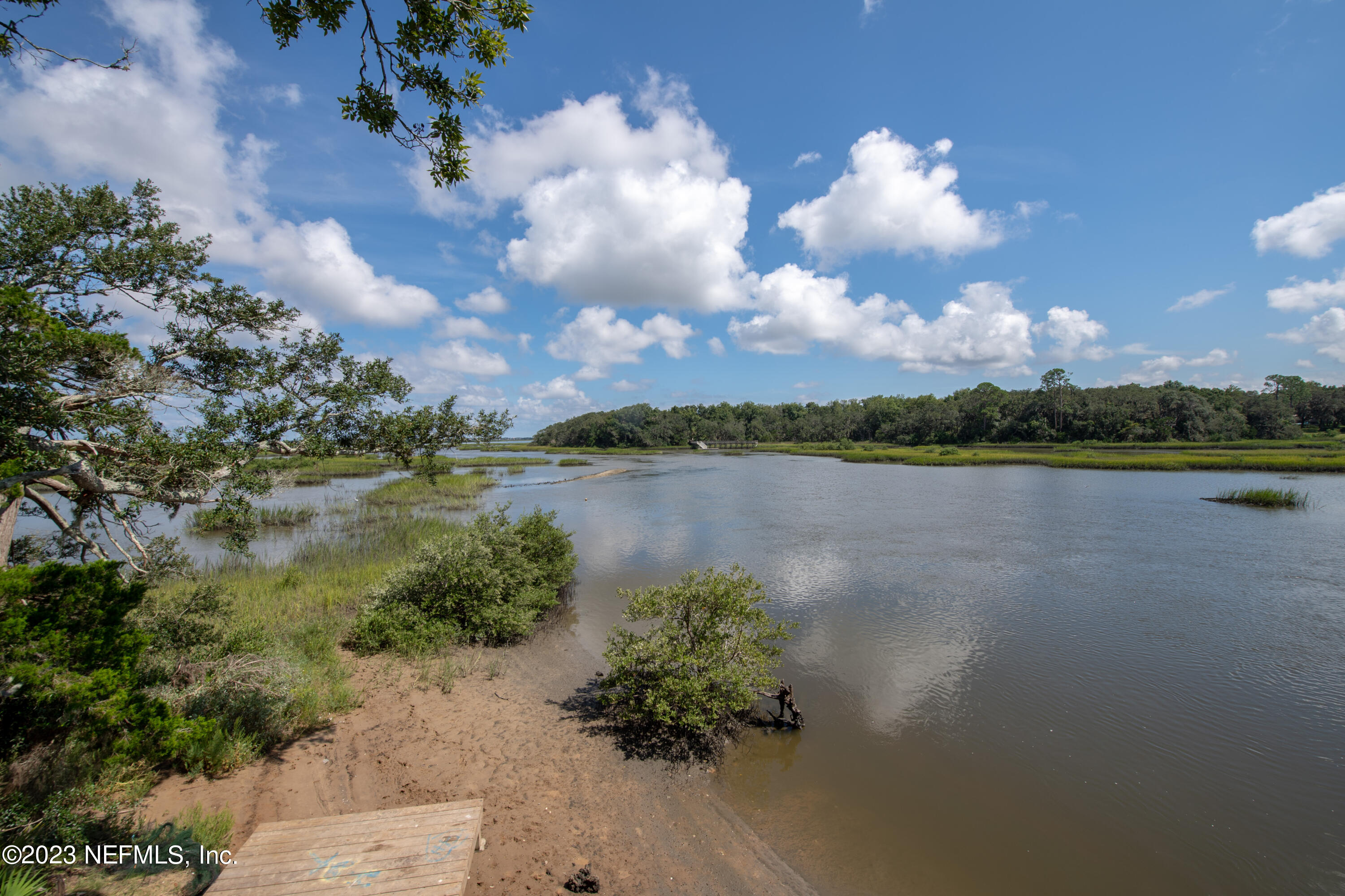 107 Heron Road St. Augustine, FL 32086 - Photo 35 of 39 a view of a lake with a city
