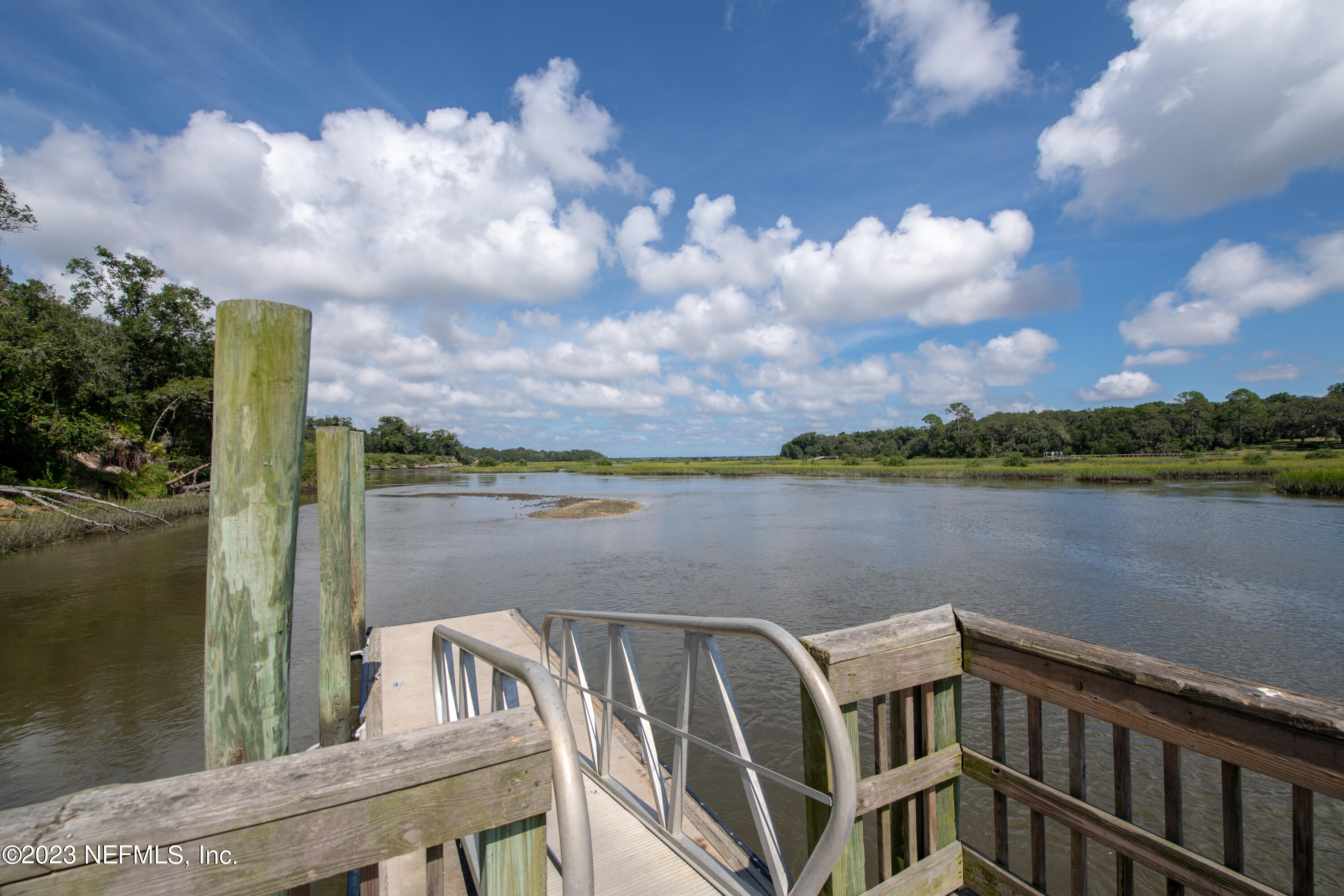 107 Heron Road St. Augustine, FL 32086 - Photo 36 of 39 a view of a lake from a balcony