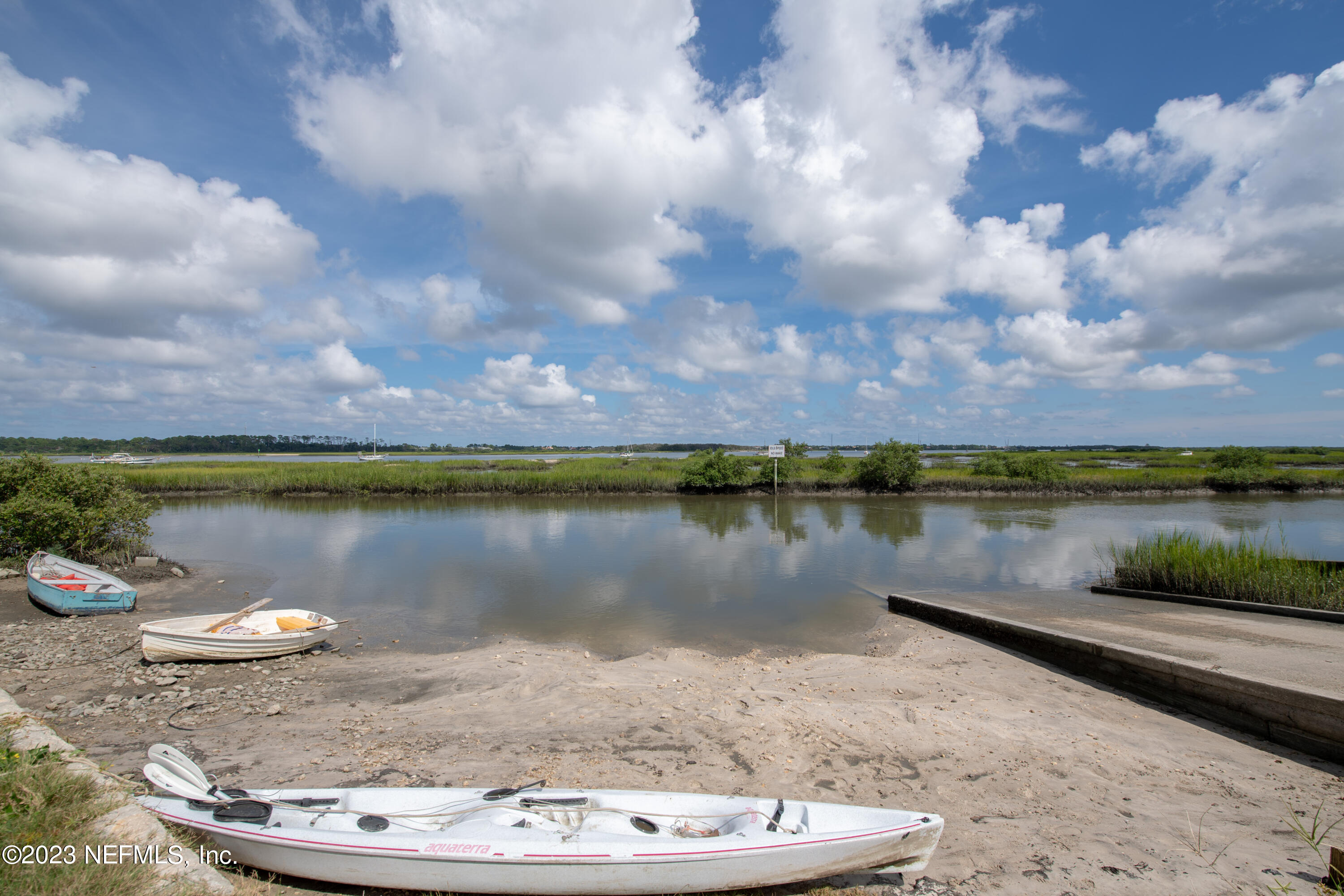 107 Heron Road St. Augustine, FL 32086 - Photo 39 of 39 a view of a lake from a yard