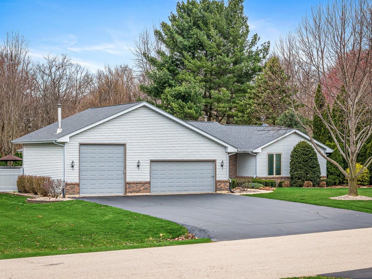 9744 Prairie Lane Belvidere, IL 61008 - Photo 2 of 66 a front view of house with yard and green space