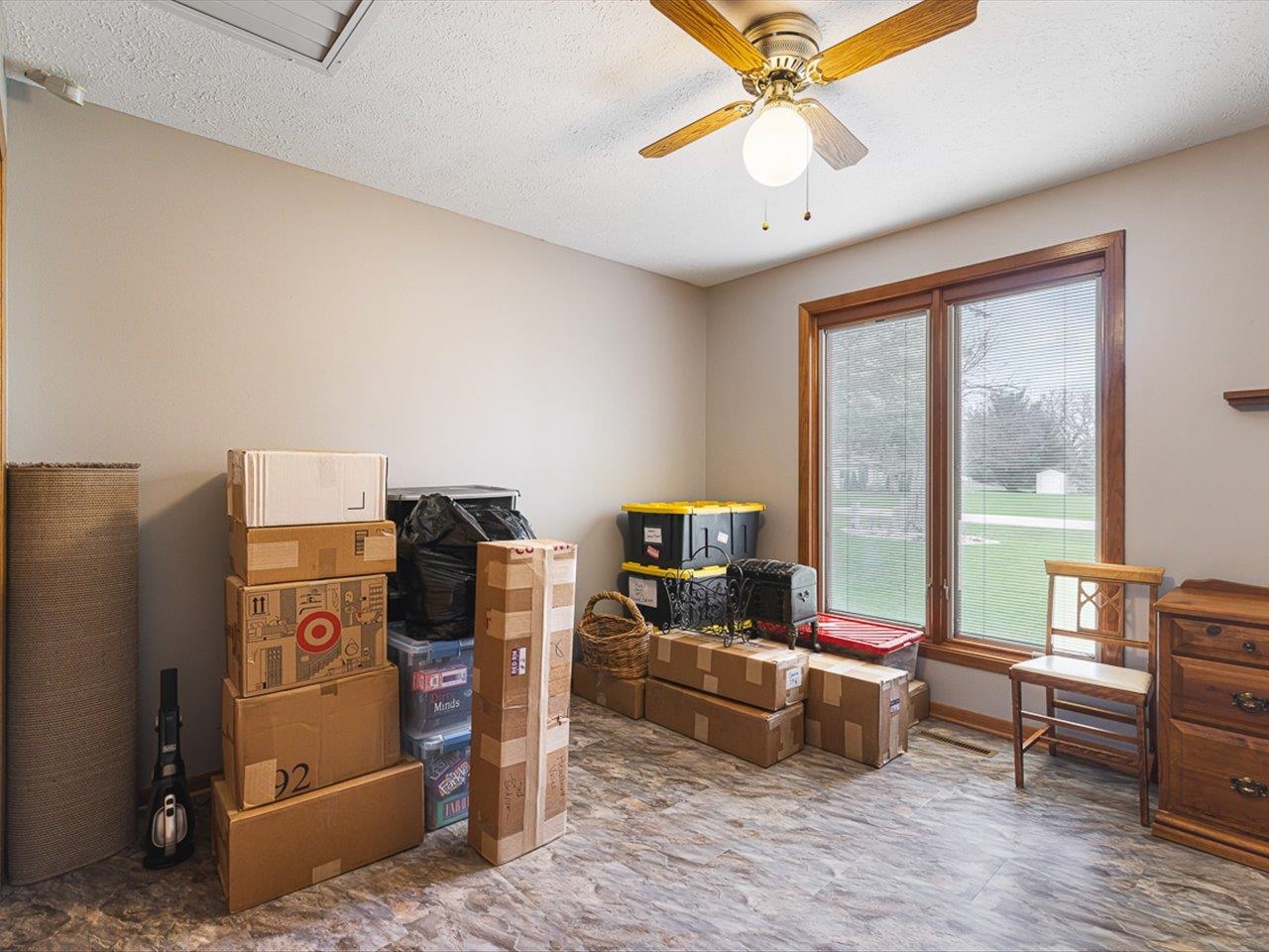 9744 Prairie Lane Belvidere, IL 61008 - Photo 31 of 66 a living room with furniture and a flat screen tv