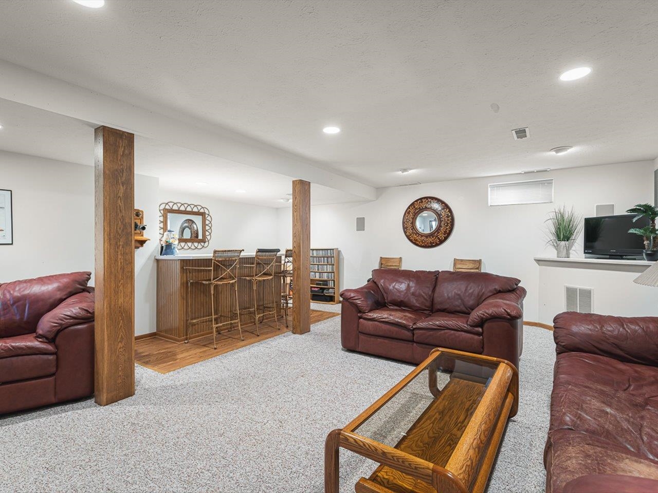 9744 Prairie Lane Belvidere, IL 61008 - Photo 32 of 66 a living room with furniture a couch and kitchen view