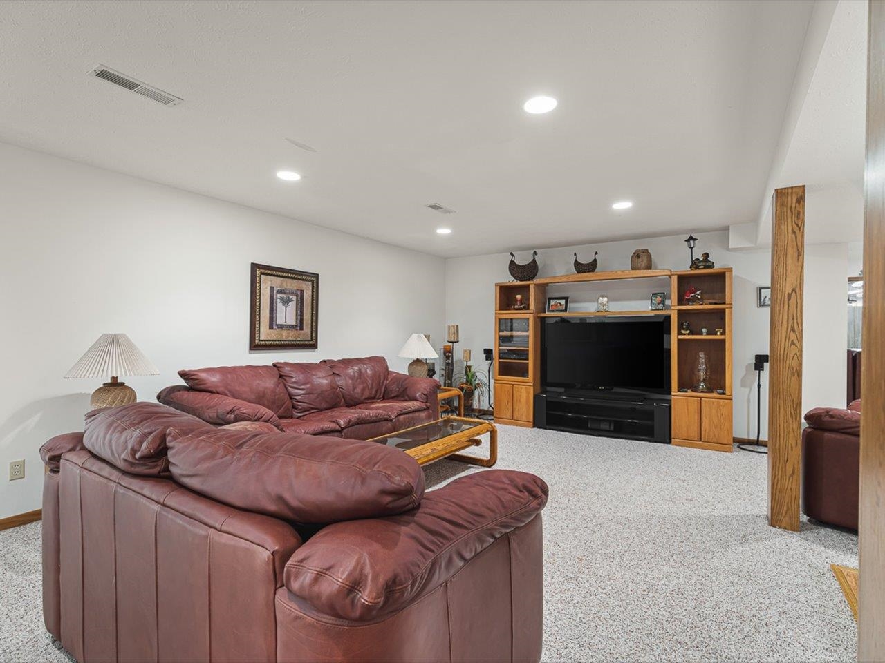 9744 Prairie Lane Belvidere, IL 61008 - Photo 33 of 66 a living room with furniture and a flat screen tv