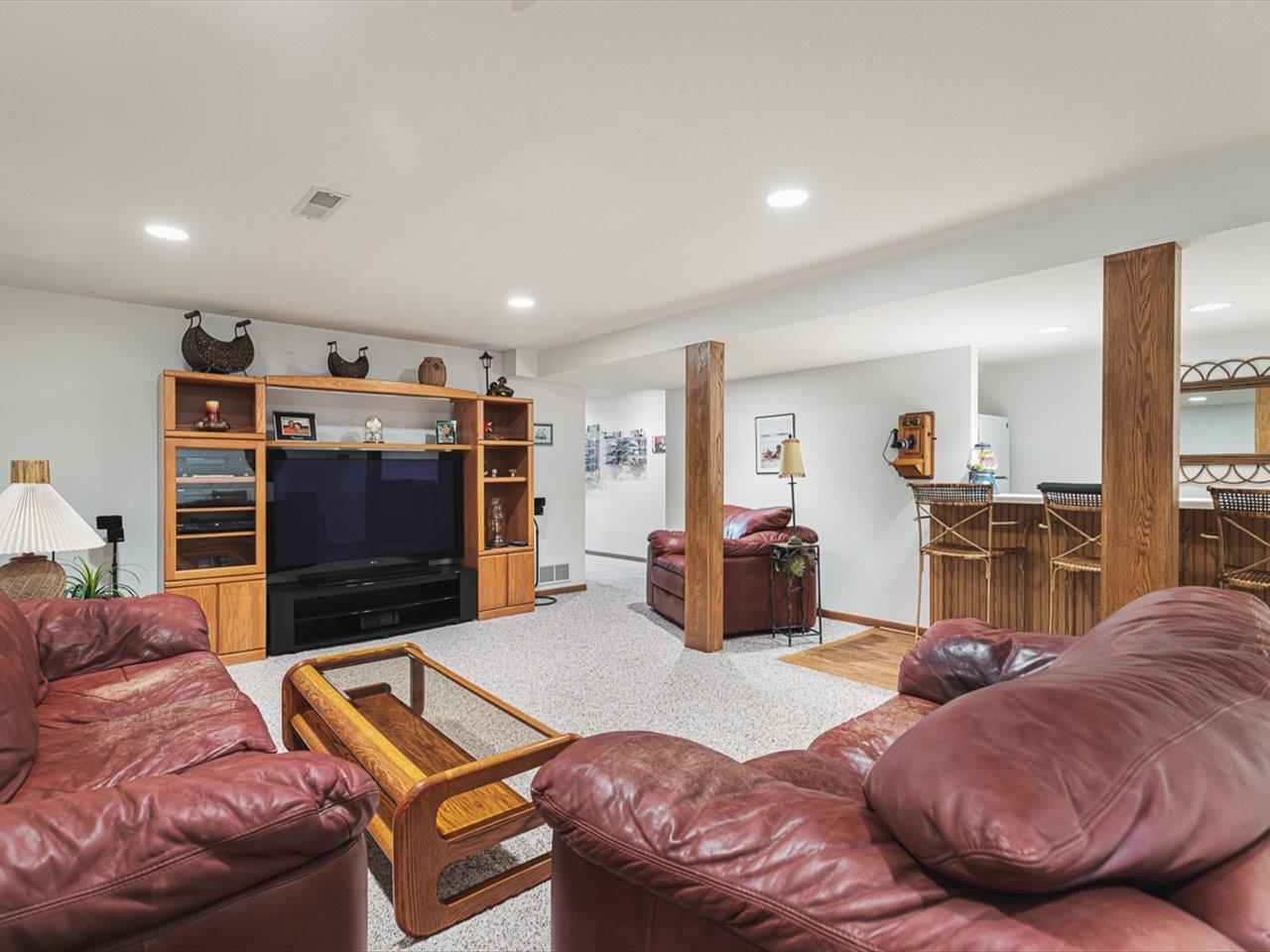 9744 Prairie Lane Belvidere, IL 61008 - Photo 34 of 66 a living room with furniture and a flat screen tv