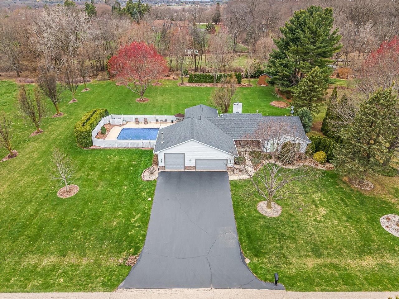 9744 Prairie Lane Belvidere, IL 61008 - Photo 5 of 66 an aerial view of a house with yard swimming pool and outdoor seating