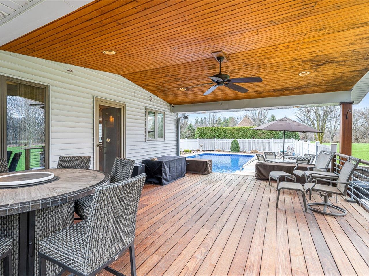 9744 Prairie Lane Belvidere, IL 61008 - Photo 53 of 66 a view of a dining room with furniture and wooden floor