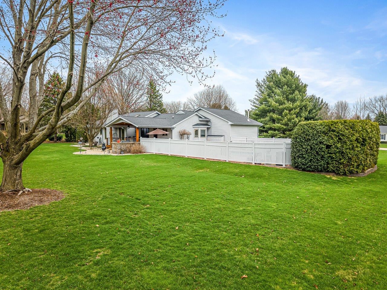 9744 Prairie Lane Belvidere, IL 61008 - Photo 58 of 66 a front view of a house with garden
