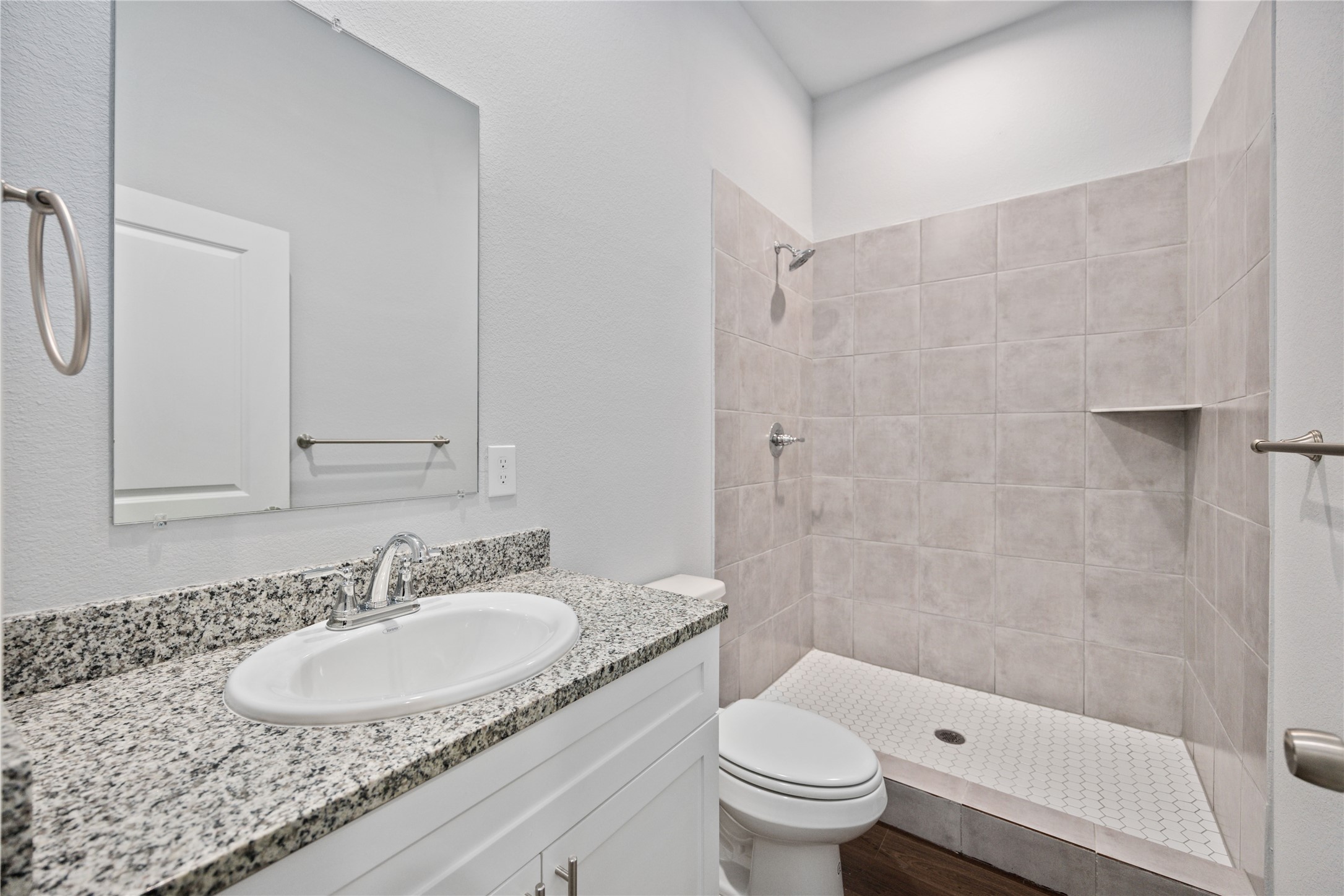 18831 Luminescent Ln Spring Spring, TX 77379 - Photo 29 of 36 a bathroom with a sink toilet and shower