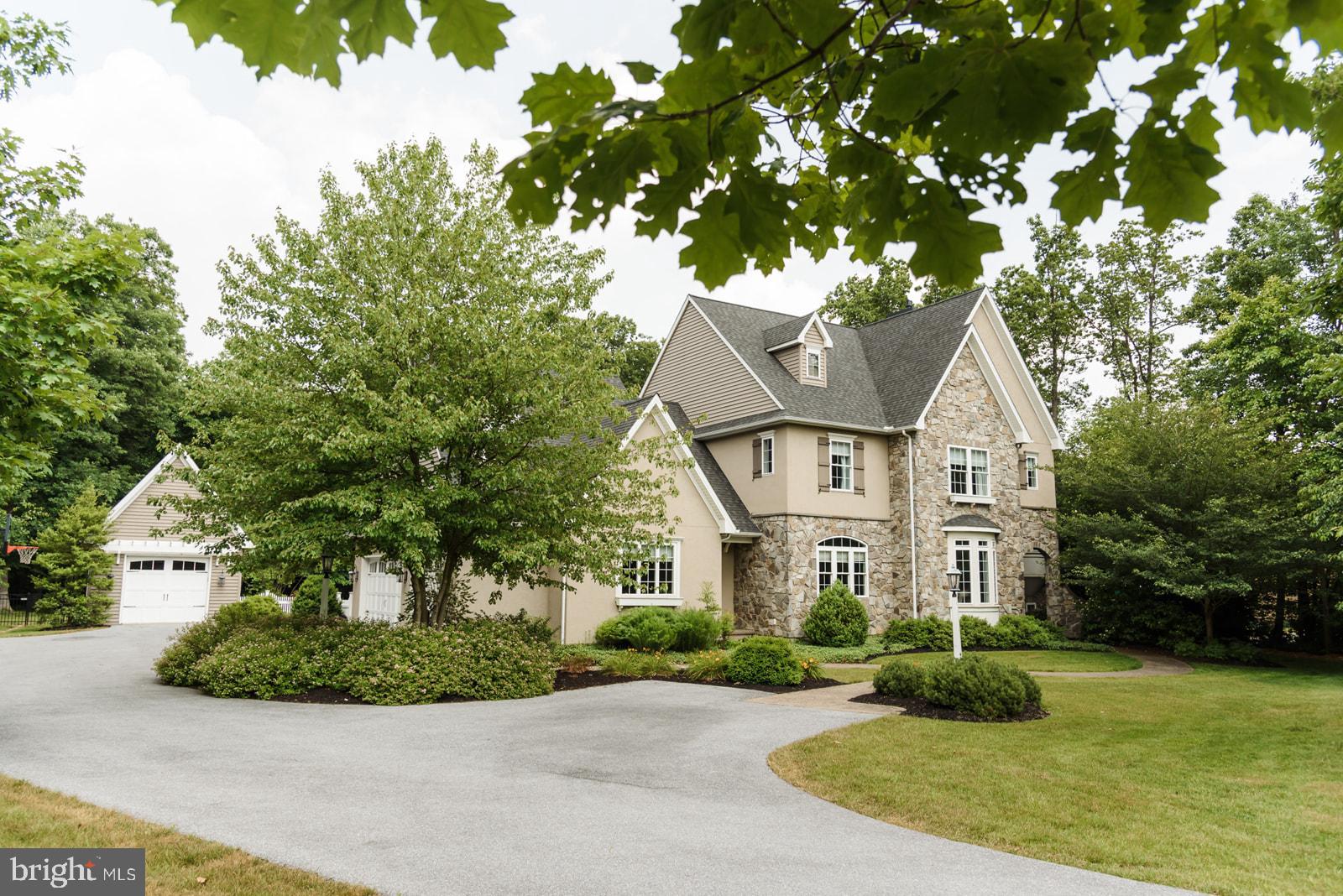 521 Meetinghouse Road Gap, PA 17527 - Photo 3 of 81 Charming stone home nestled in lush greenery.