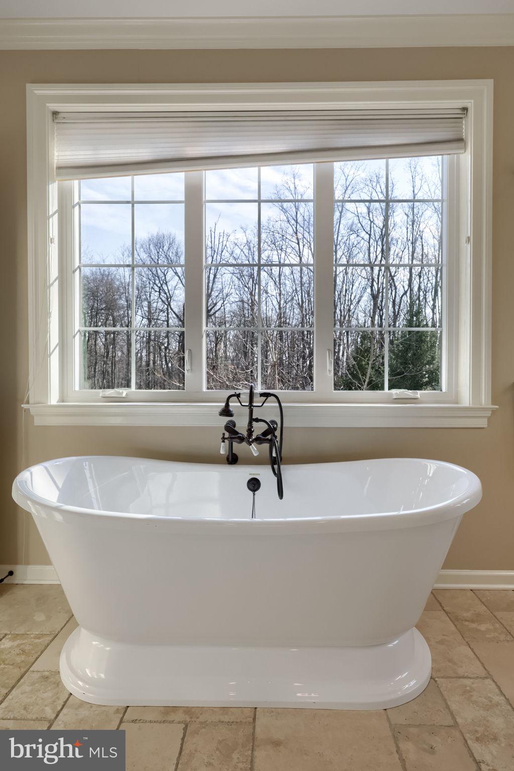 521 Meetinghouse Road Gap, PA 17527 - Photo 44 of 79 a white bath tub sitting in a bathroom