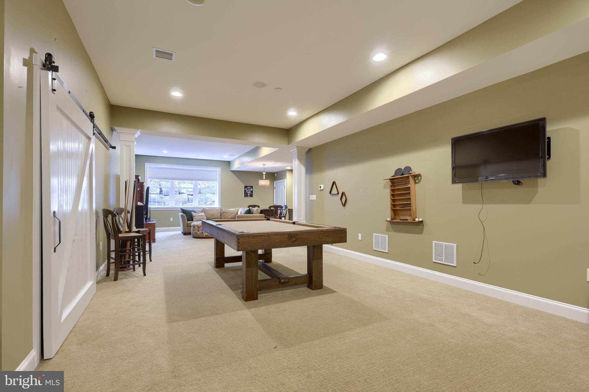 521 Meetinghouse Road Gap, PA 17527 - Photo 63 of 79 a view of a livingroom with furniture and a flat screen tv
