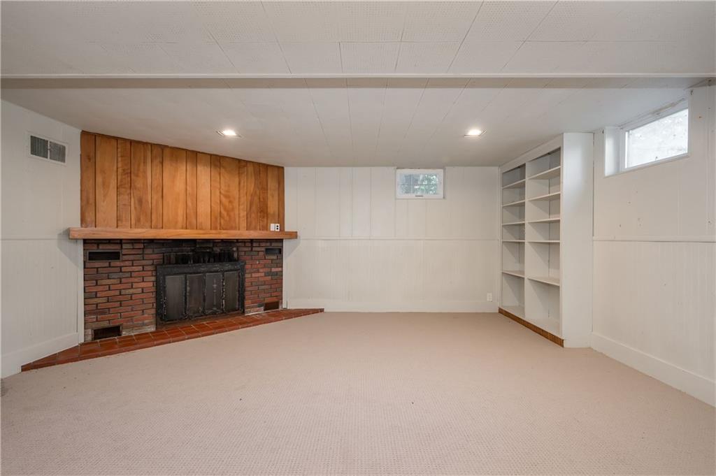 205 Forrester Road Slippery Rock, PA 16057 - Photo 22 of 25 a view of an empty room with a kitchen