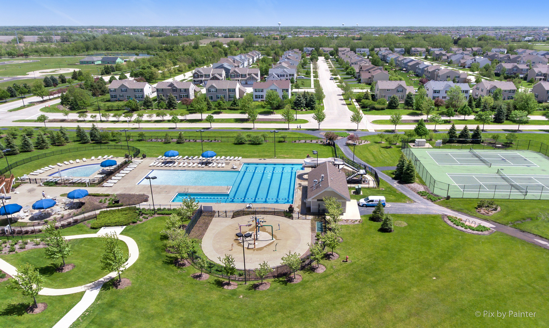 10232 McMahon Way Huntley, IL 60142 - Photo 45 of 46 an aerial view of a house with a garden and swimming pool
