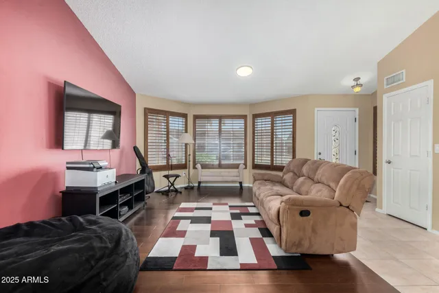 a room with furniture and a window