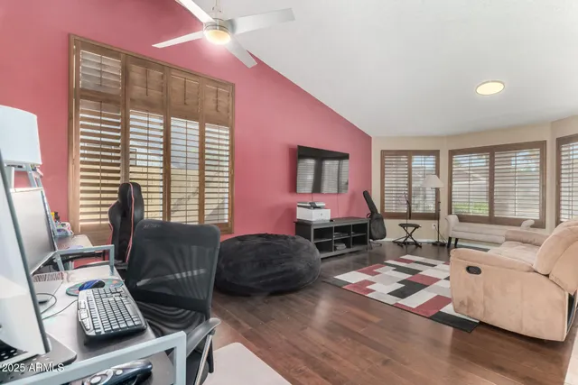 a living room with furniture and a window