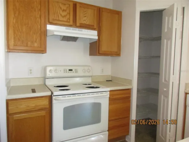 a view of hallway with closet