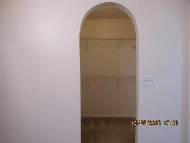 a view of a room with racks on the wall