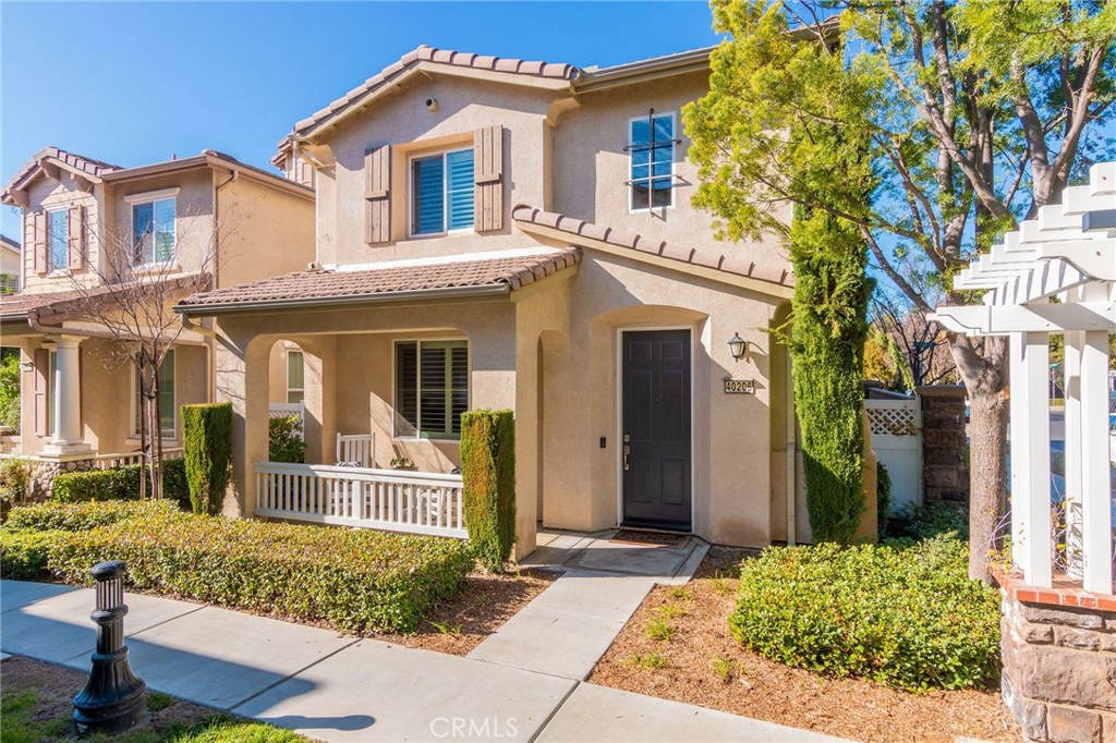 front view of a house with a small yard