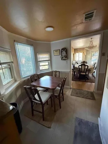 a view of a livingroom and dining room