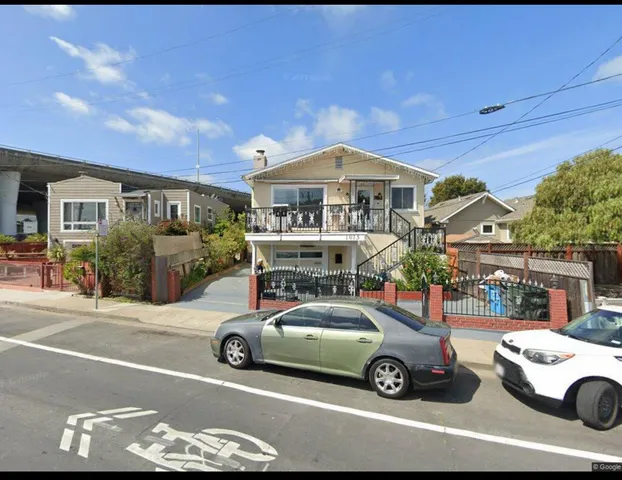a car parked in front of a house