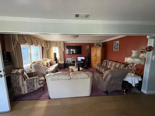 a living room with furniture and a couch