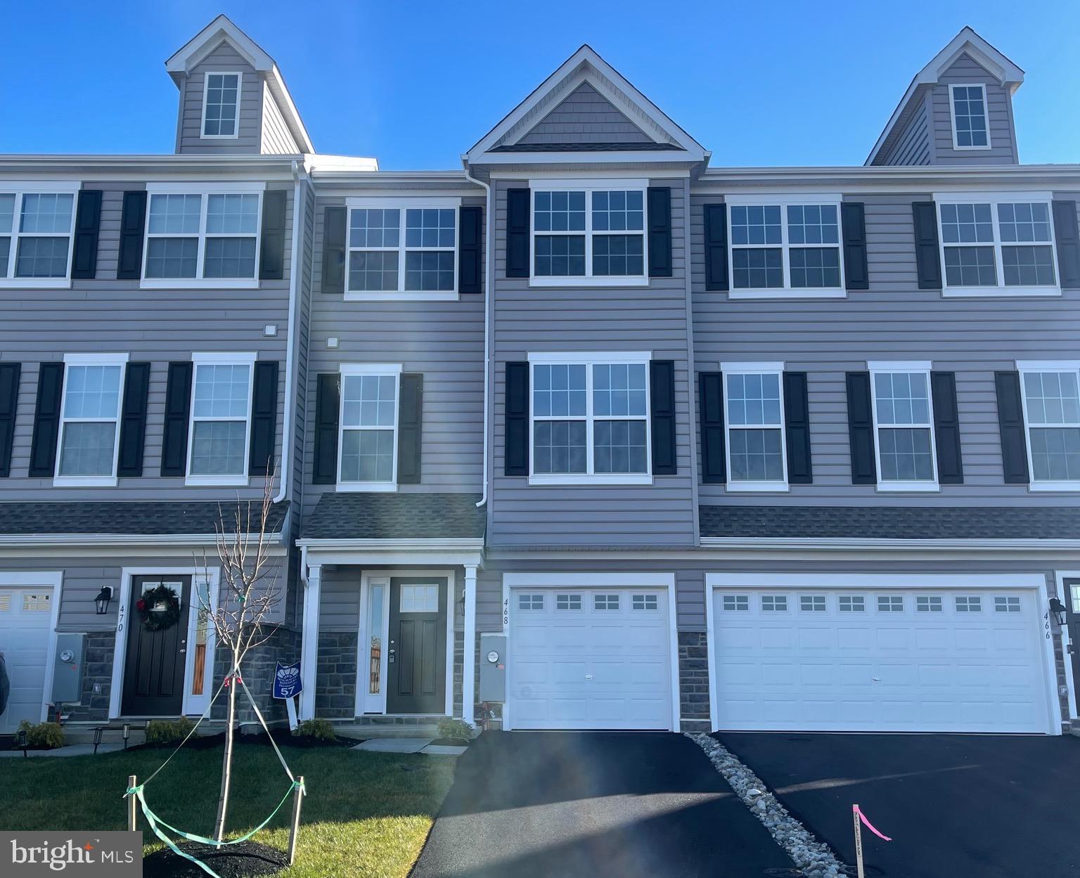 444 Rederick Lane Middletown, DE 19709 - Photo 1 of 16 a front view of a house with a yard