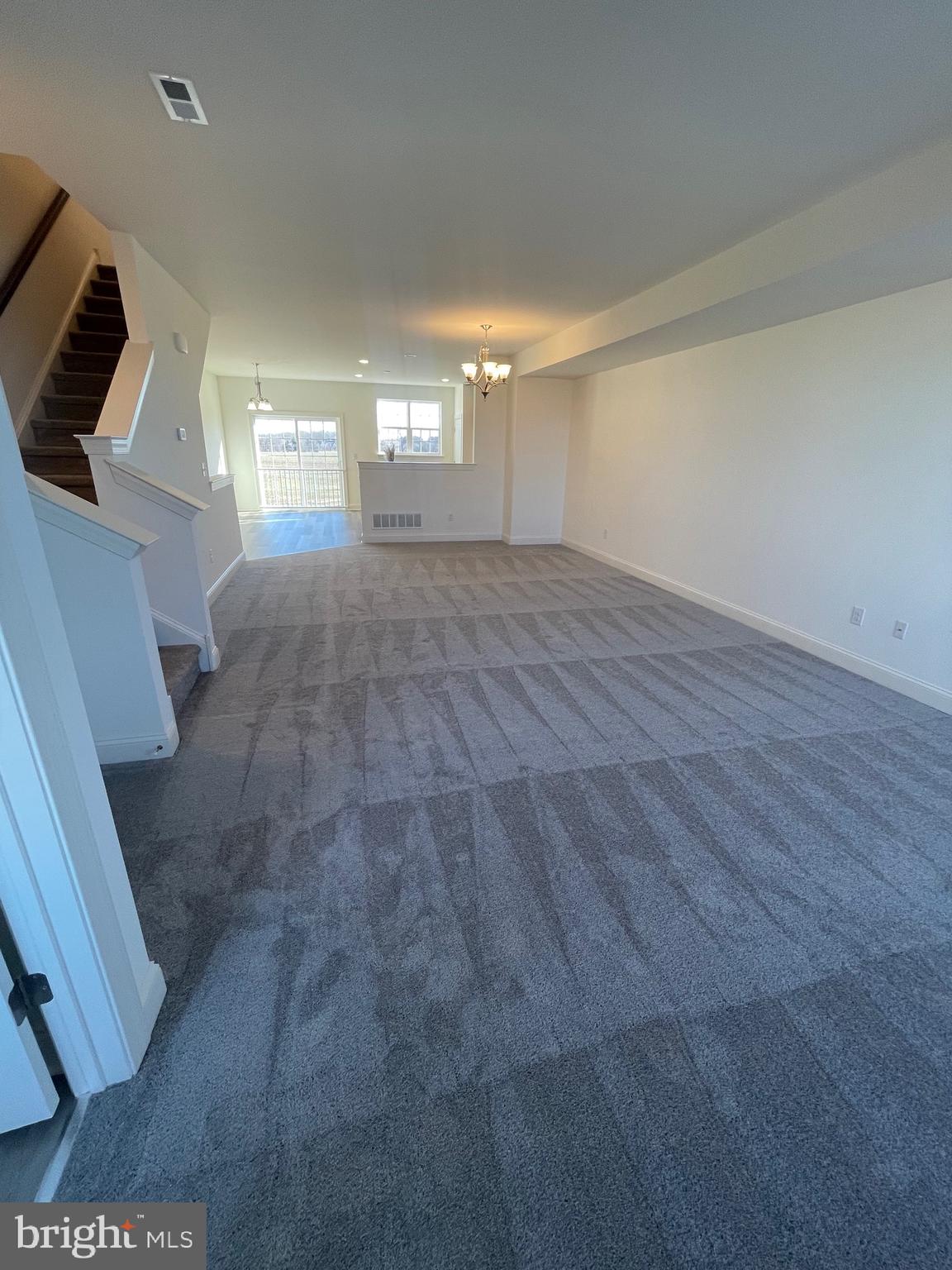 444 Rederick Lane Middletown, DE 19709 - Photo 6 of 16 a view of empty room with wooden floor and fan