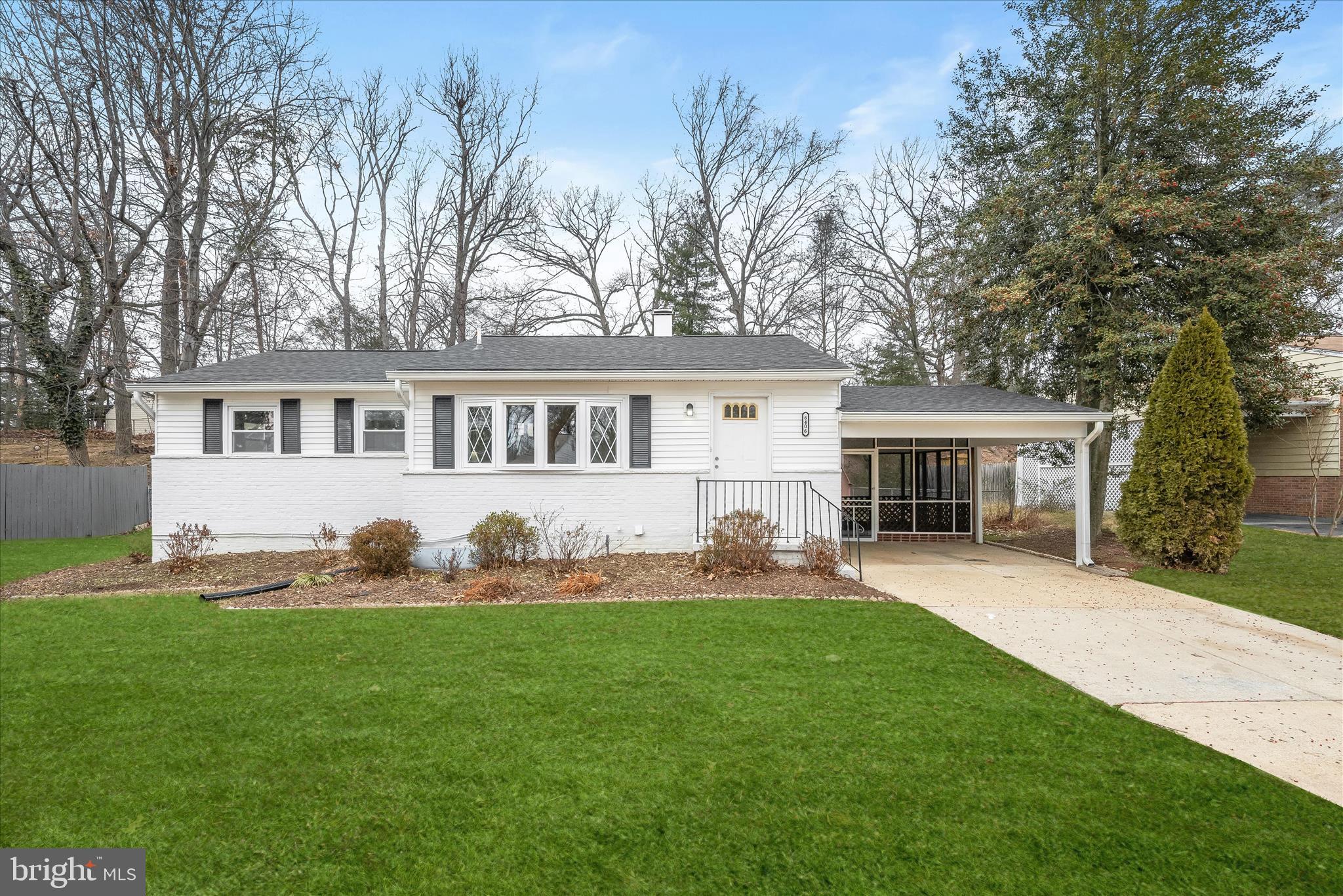 a front view of house with yard and seating area