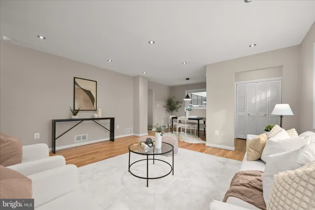 a living room with furniture and white walls