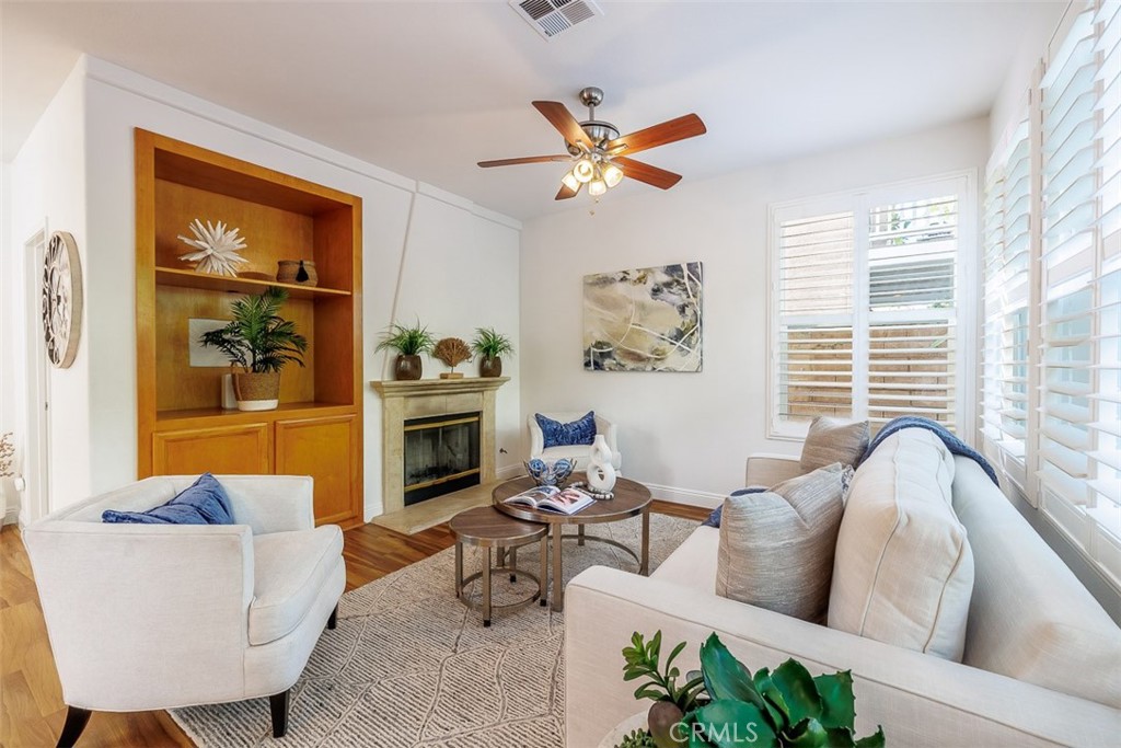 41 Castletree Rancho Santa Margarita, CA 92688 - Photo 17 of 68 a living room with furniture and a fireplace