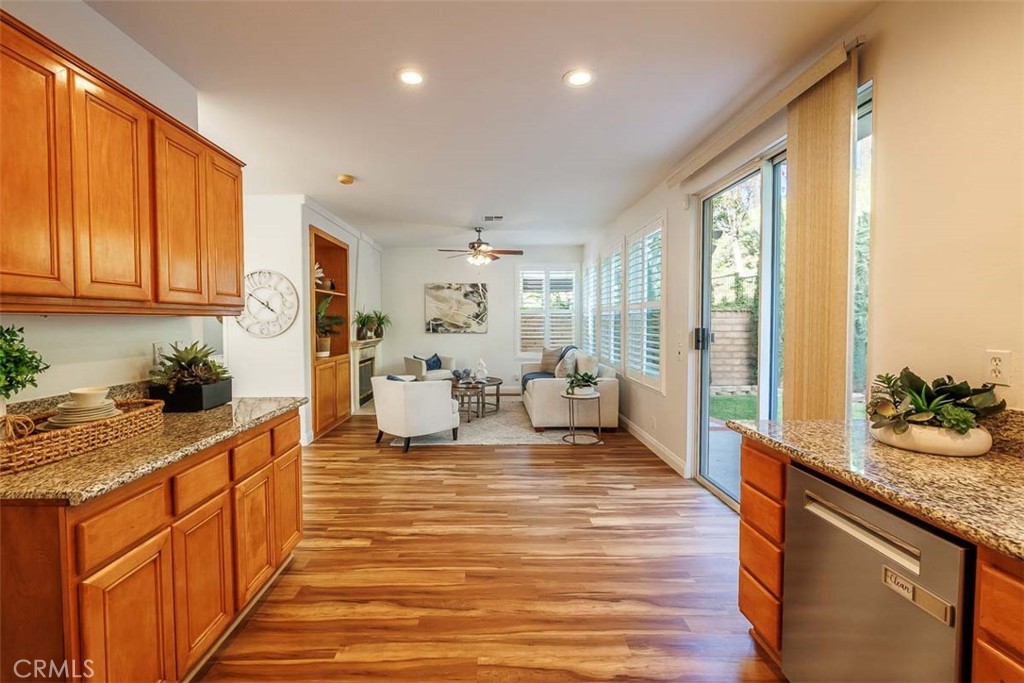 41 Castletree Rancho Santa Margarita, CA 92688 - Photo 23 of 68 a large kitchen with stainless steel appliances granite countertop a sink and cabinets