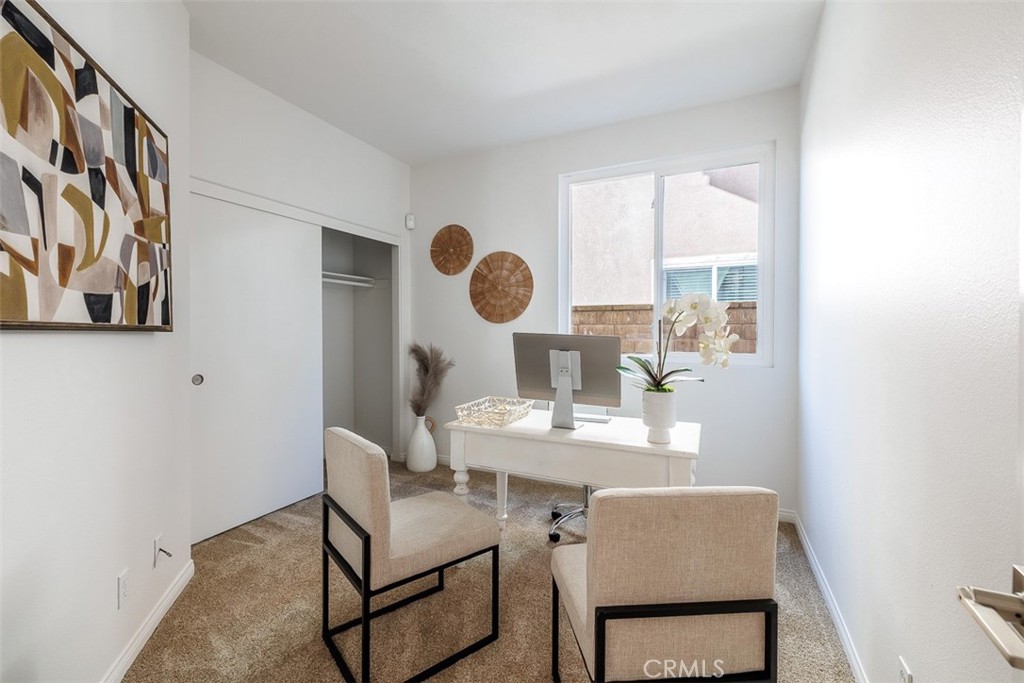 41 Castletree Rancho Santa Margarita, CA 92688 - Photo 24 of 68 a living room with furniture and a window