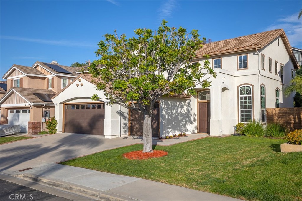 41 Castletree Rancho Santa Margarita, CA 92688 - Photo 3 of 68 a front view of a house with a garden