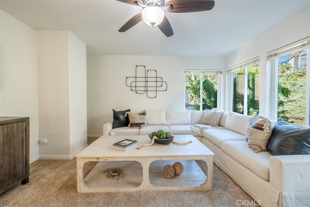 41 Castletree Rancho Santa Margarita, CA 92688 - Photo 33 of 68 a living room with furniture and a large window