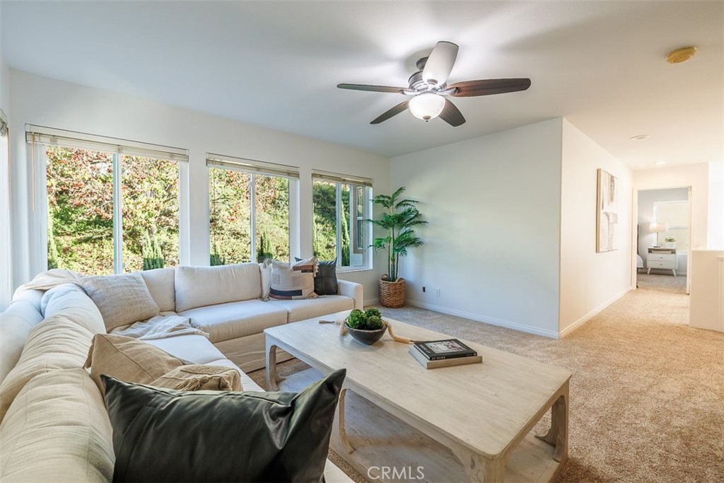 41 Castletree Rancho Santa Margarita, CA 92688 - Photo 35 of 68 a living room with furniture and window