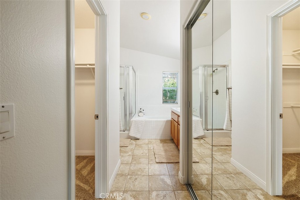 41 Castletree Rancho Santa Margarita, CA 92688 - Photo 39 of 68 a bathroom with a tub and shower
