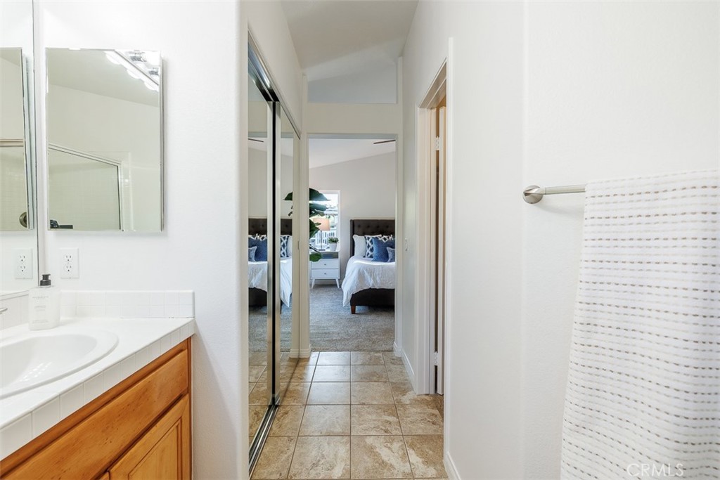 41 Castletree Rancho Santa Margarita, CA 92688 - Photo 40 of 68 a en suite bathroom with a sink and a mirror