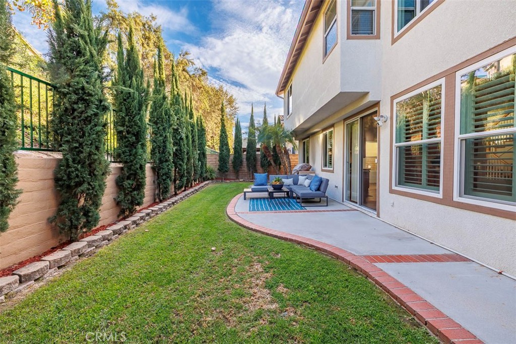 41 Castletree Rancho Santa Margarita, CA 92688 - Photo 52 of 68 a view of a house with backyard and porch