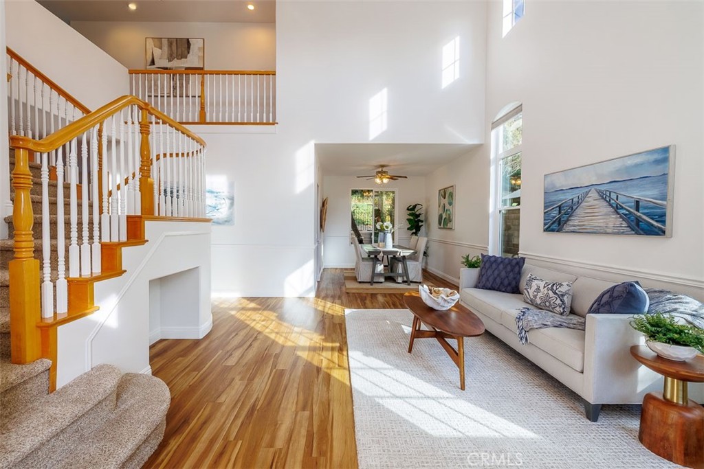 41 Castletree Rancho Santa Margarita, CA 92688 - Photo 6 of 68 a living room with furniture and a wooden floor