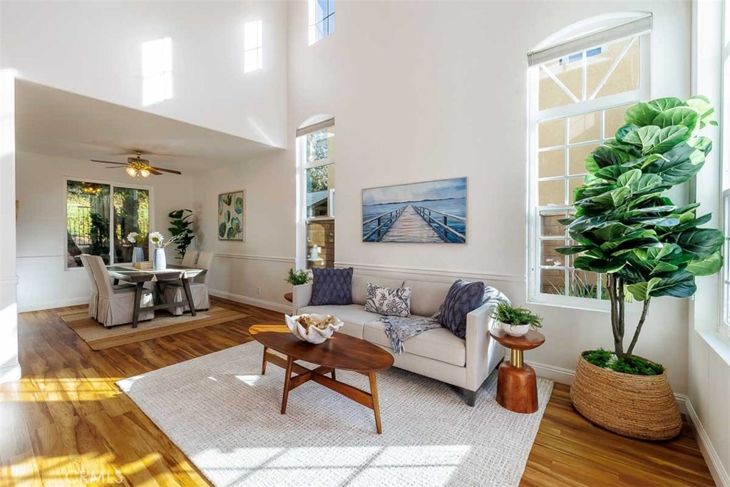 41 Castletree Rancho Santa Margarita, CA 92688 - Photo 7 of 68 a living room with furniture potted plant and a window