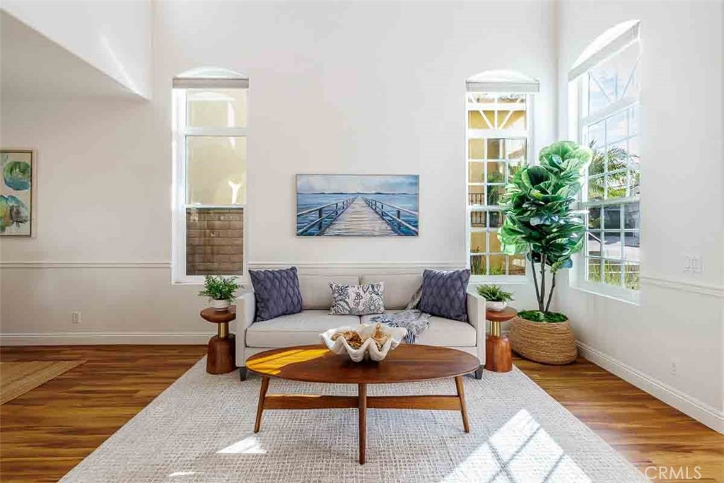 41 Castletree Rancho Santa Margarita, CA 92688 - Photo 8 of 68 a living room with furniture and a potted plant