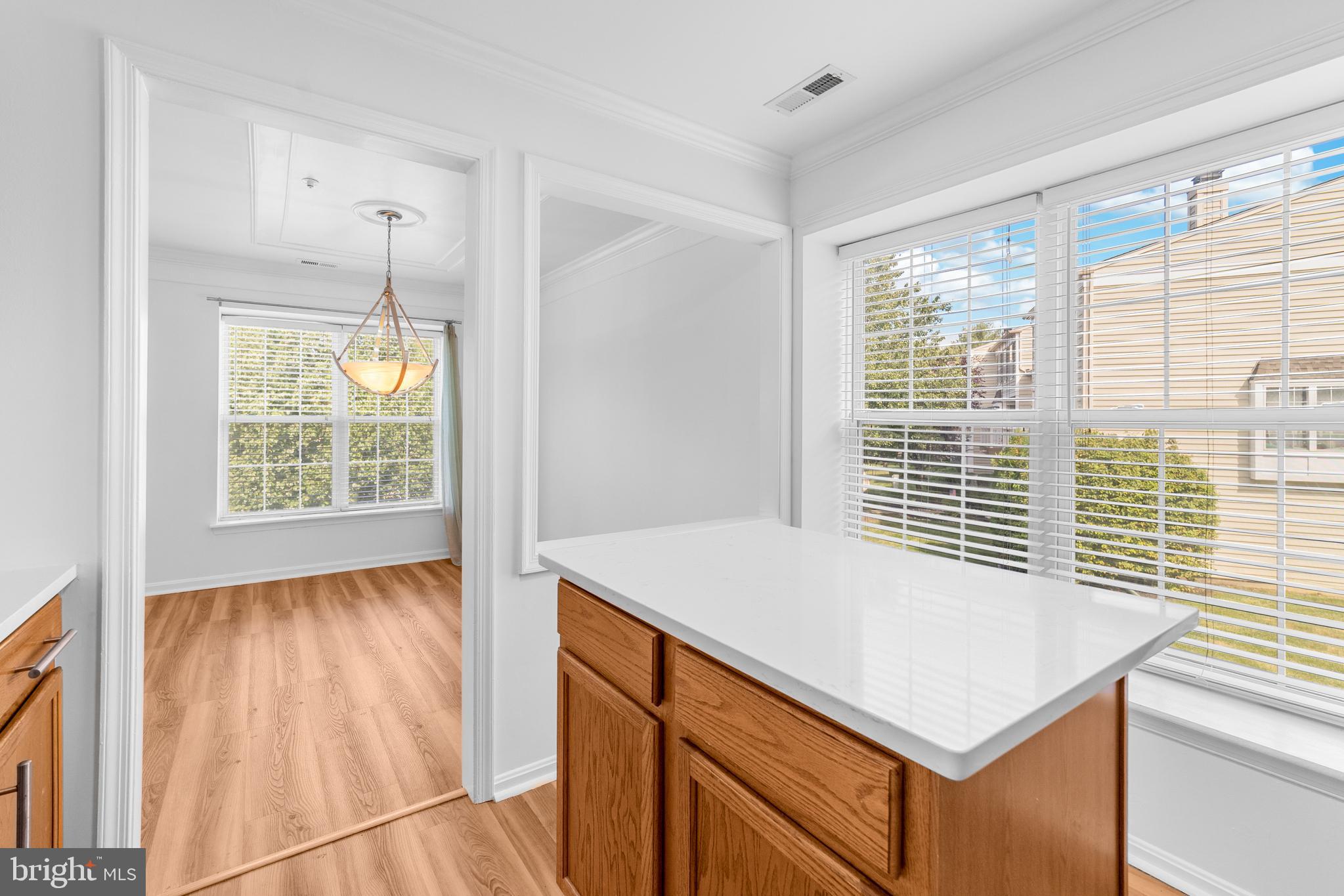 1010 Crestmont Drive Mantua, NJ 08051 - Photo 13 of 25 a kitchen with a stove a sink and a window