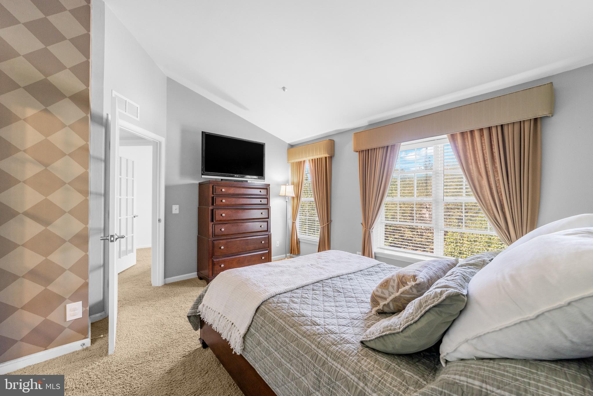 1010 Crestmont Drive Mantua, NJ 08051 - Photo 20 of 25 a bedroom with a bed and a television