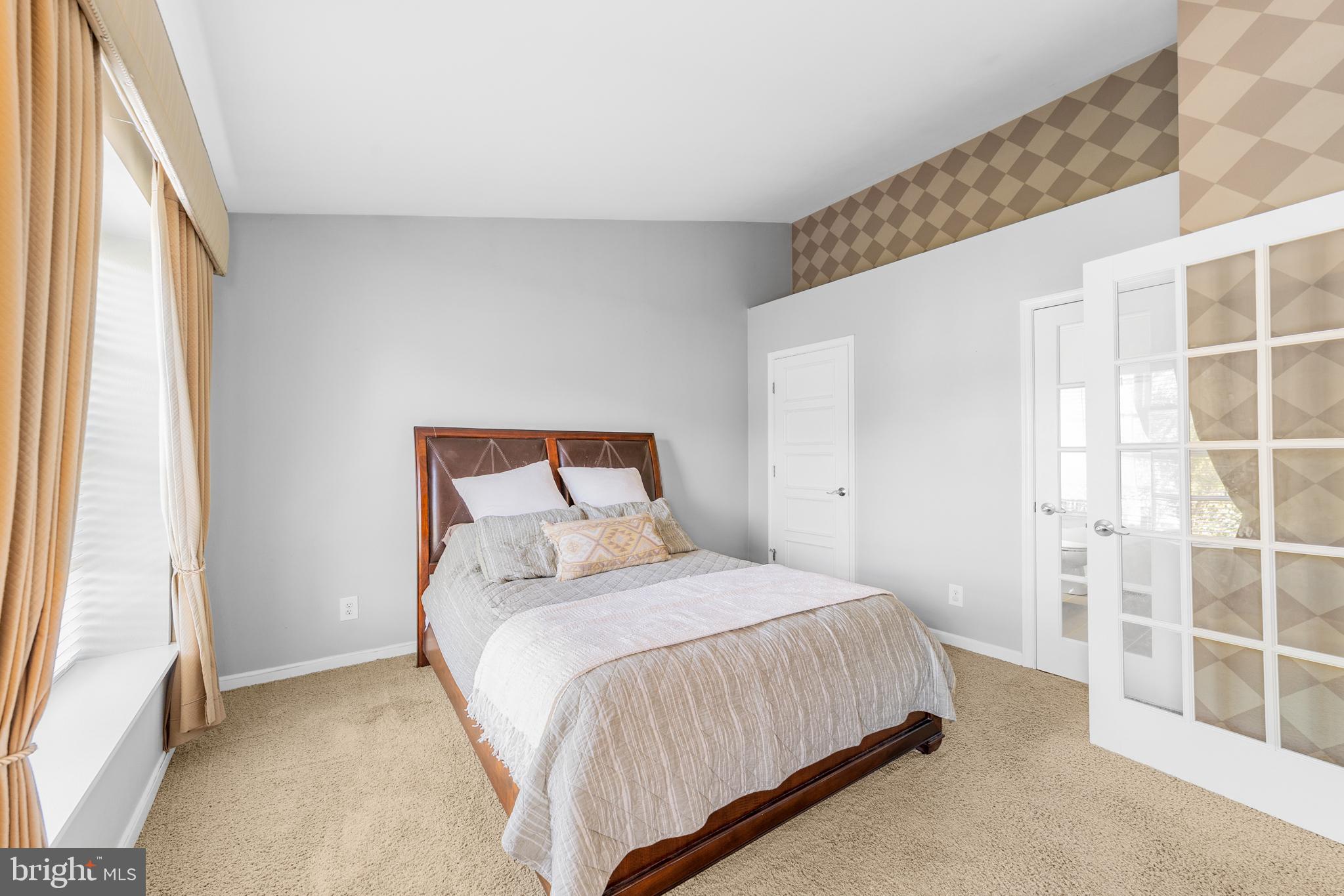 1010 Crestmont Drive Mantua, NJ 08051 - Photo 21 of 25 a bedroom with a bed and a window