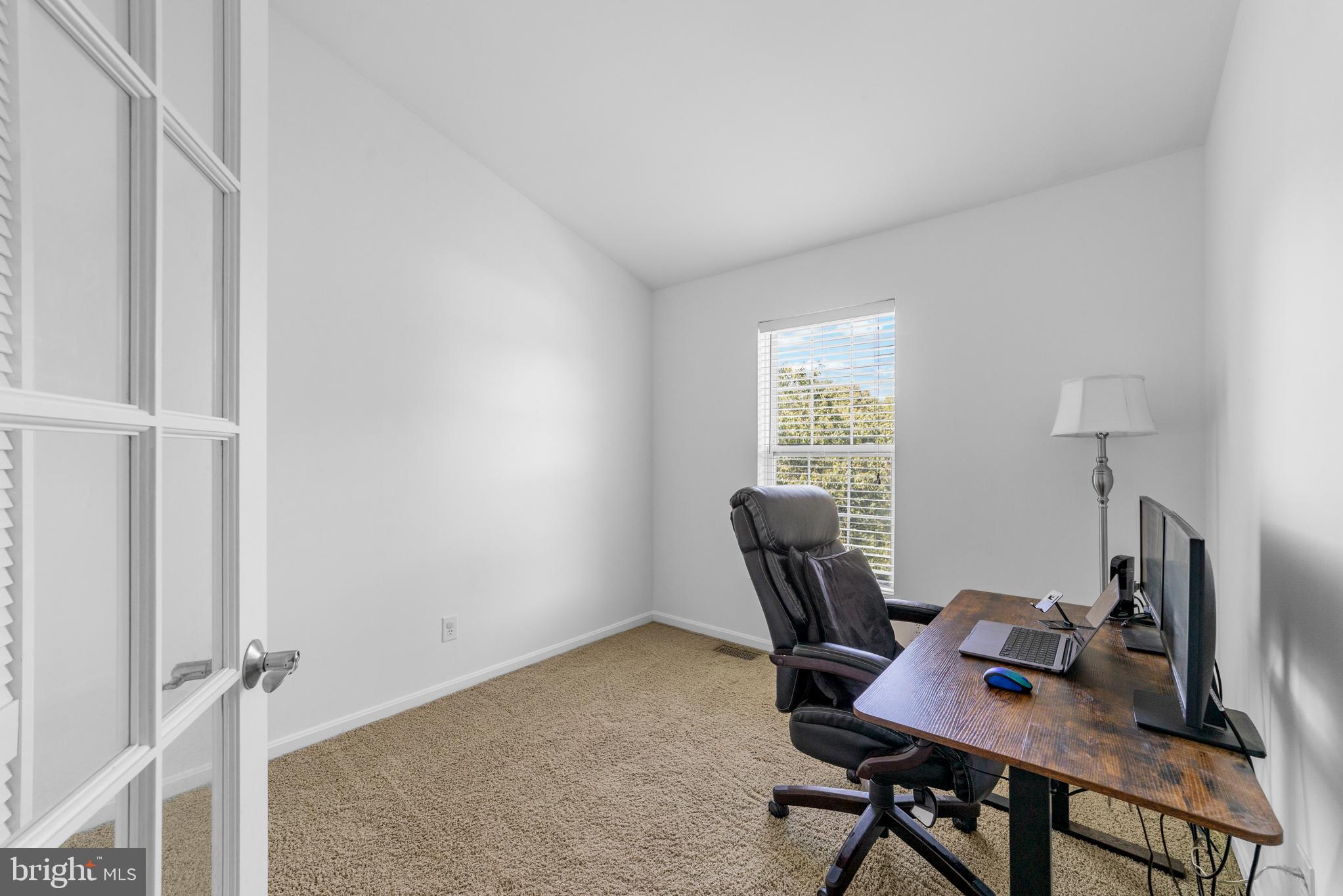 1010 Crestmont Drive Mantua, NJ 08051 - Photo 22 of 25 a view of a workspace with furniture and a window