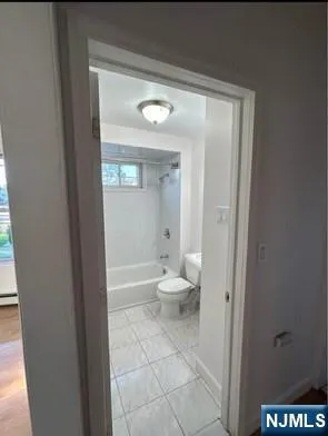 a bathroom with a toilet