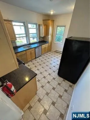 a living room with a couch and a large window
