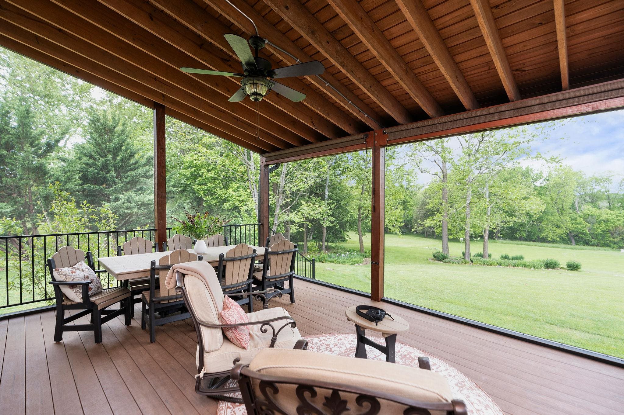 216 Lee Roy Road Grottoes, VA 24441 - Photo 31 of 64 a view of a patio with chairs and floor to ceiling window
