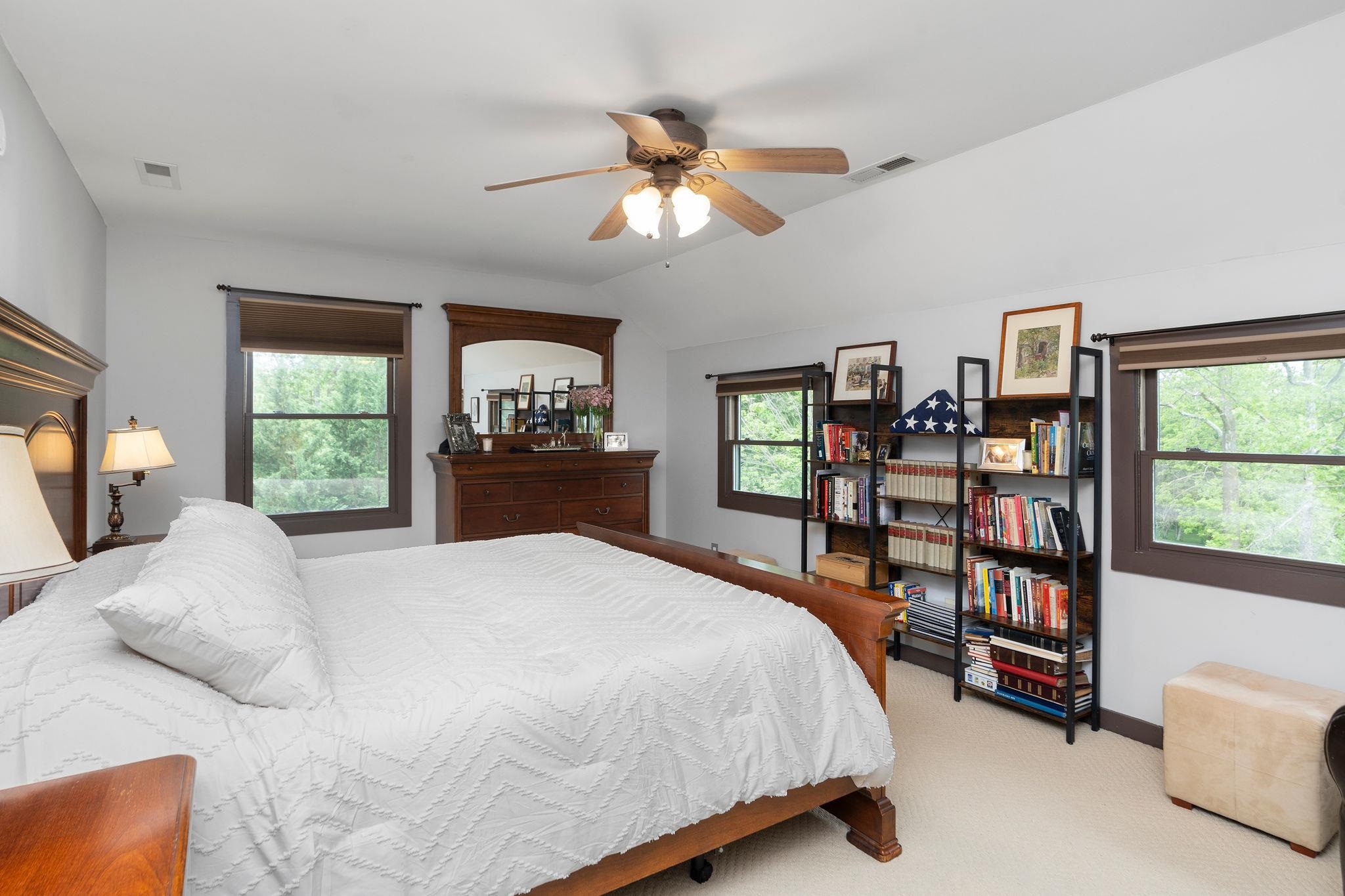 216 Lee Roy Road Grottoes, VA 24441 - Photo 38 of 64 a bedroom with a bed a dresser and a large window