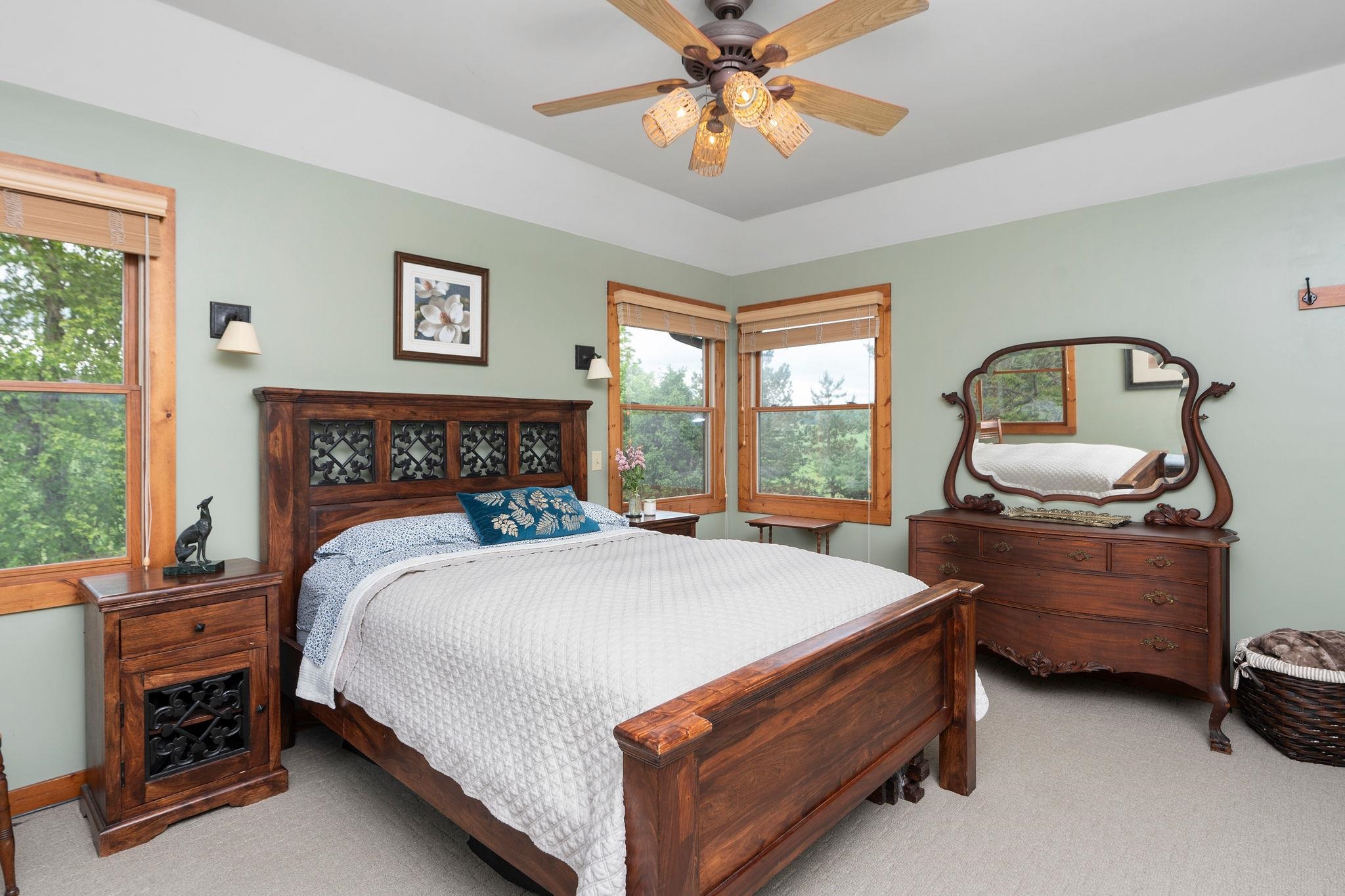 216 Lee Roy Road Grottoes, VA 24441 - Photo 39 of 64 a bed sitting in a bedroom next to a window